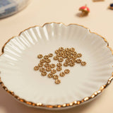 Perles Rondelles fleurettes 5mm