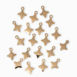 Breloques étoiles rose des vents 6mm