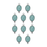 Ovale sertie en pierres fines 9x13mm - Rhodié