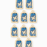 Pendentif médaille papillon 12.5x9.5mm - Doré