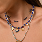 Pendentif médaille oeil 11x13mm