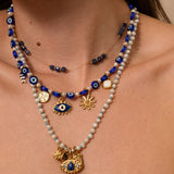 Pendentif poisson rayé 12x5.5mm