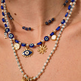 Pendentif poisson rayé 12x5.5mm