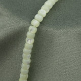 Perles rondelles en nacre naturelle blanc 6x4mm
