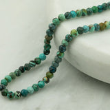 Perles ronde aplatie 4mm - Turquoise africaine